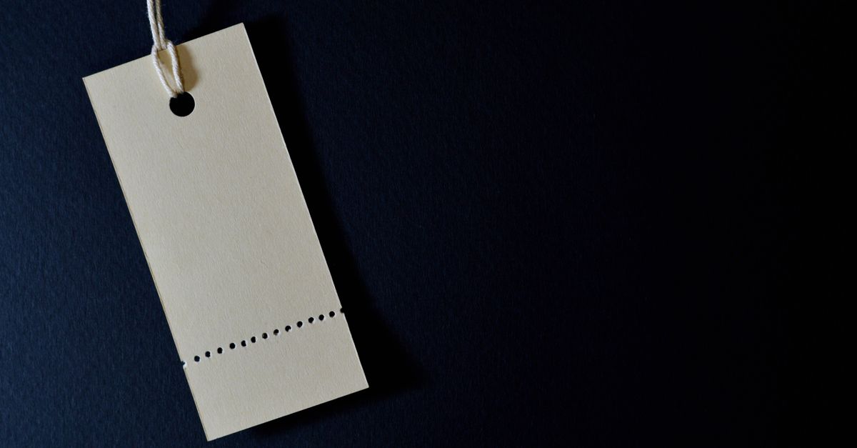 Blank price tag on a dark background, symbolising transfer pricing